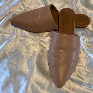 Beige mule slip on.